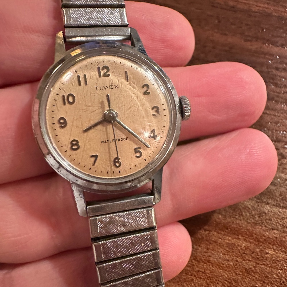 vintage Timex Silver and Beige Waterproof Watch. Works great.